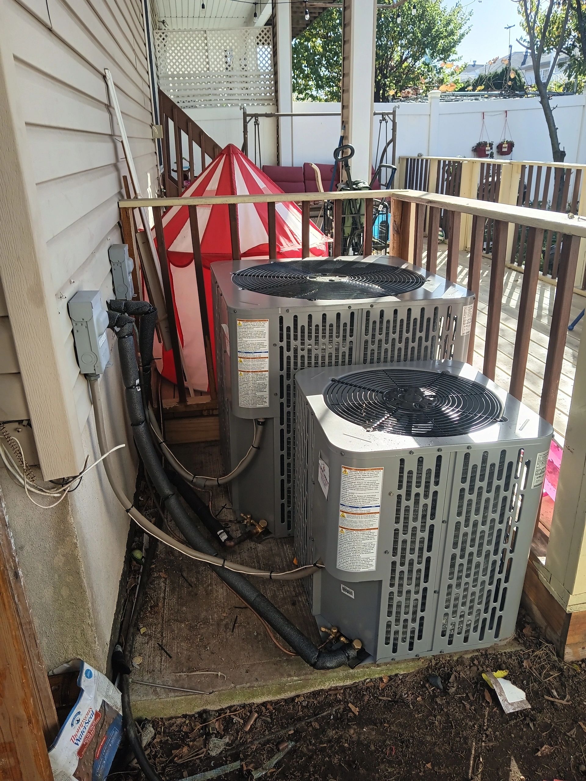 Outdoor air conditioning units installed by T&T Cooling & Heating